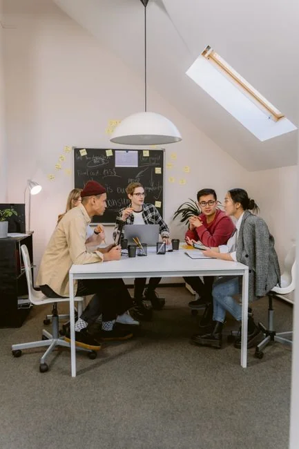 Man studying marketing content strategies with sticky notes arranged on a whiteboard.